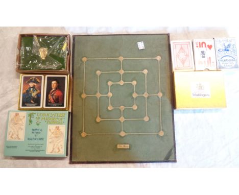 A vintage game board - sold with a set of vintage unopened Guinness playing cards, and further boxed and unboxed decks of car