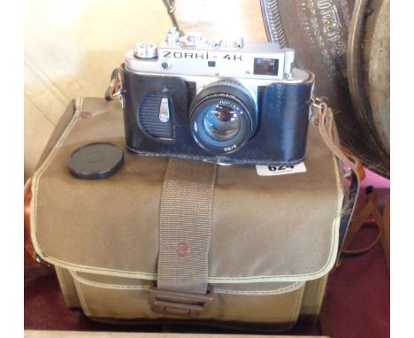 A vintage USSR Zorki-4K rangefinder camera with Jupiter 8 lens, Ever-Ready case, book and tripod, in Helios 2000 carry case