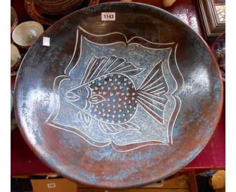 A large continental ceramic bowl with fish motif