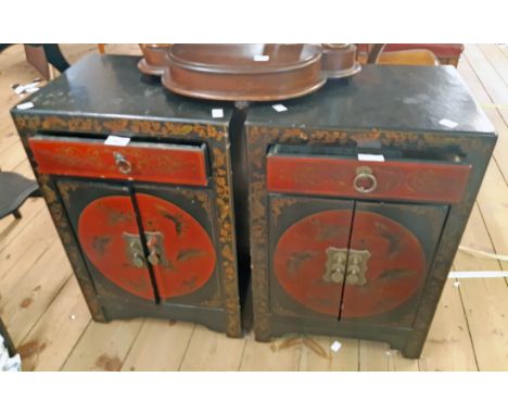 A pair of 16" modern Oriental lacquered bedside cabinets each with drawer to top butterfly scroll decoration and pair of door