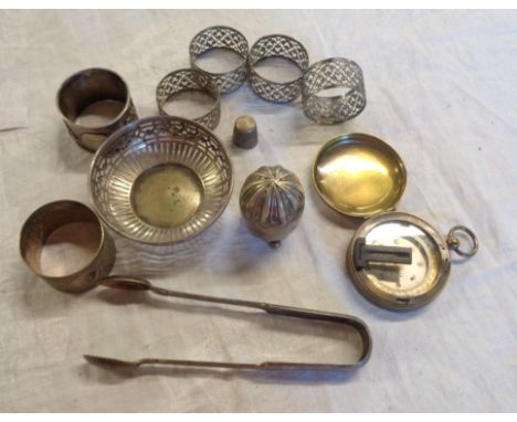 A small quantity of metalware including a thimble, pepperette, napkin rings, brass compass (a/f) etc.