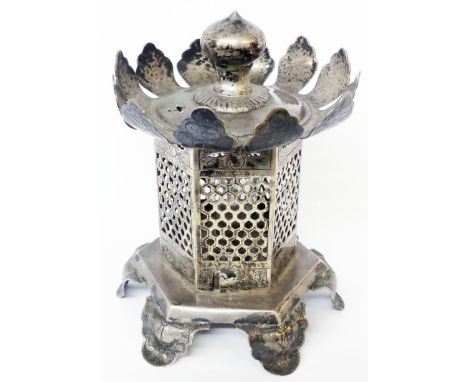 A 6 1/2" early 20th Century Chinese Wang Hing 90 grade white metal cricket cage of faceted pagoda design with engraved petal 