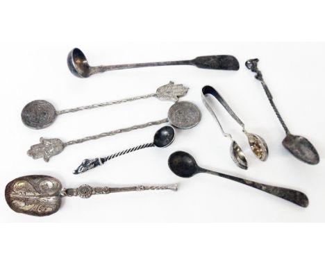 A small quantity of silver cutlery items including silver nips, small ladle and plated Islamic coin style spoons, etc.