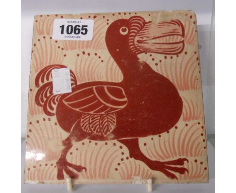 A William de Morgan ruby lustre tile depicting the Dodo - rubbed and chipped to edge