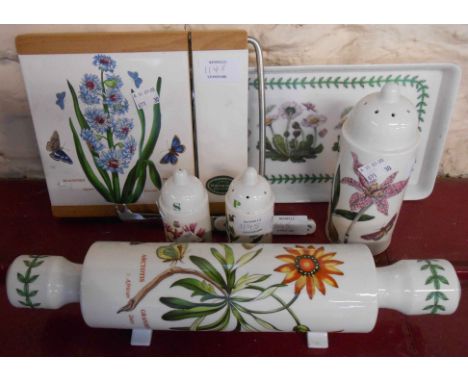 A Portmeirion Botanic Garden rolling pin and stand, sugar sifter, salt and pepper, cheese board, cutter and knife, and a mela