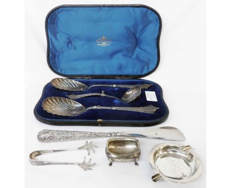 A small silver presentation ashtray, salt and pair of claw pattern sugar tongs - sold with a cased Mappin Bros silver plated 