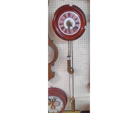 A late 19th/early 20th Century stained wood cased Postman's alarm wall clock with alarm set centre dial and pink and white ma
