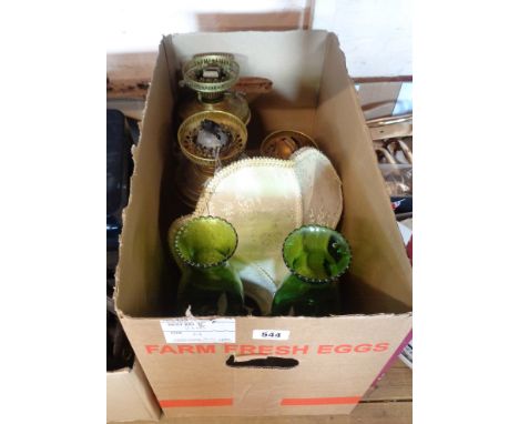 Three brass table oil lamps, two green glass similar and a lamp shade with beaded fringe