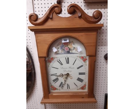 A modern waxed pine framed battery wall clock with longcase style arched dial marked for Duncan Hunter, Danbury