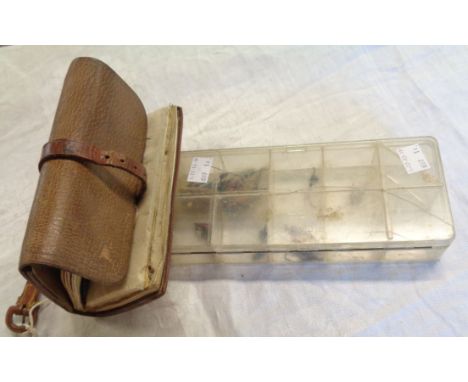 A vintage leather wallet wrap containing a collection of salmon and sea trout flies - sold with a tray containing larger exam