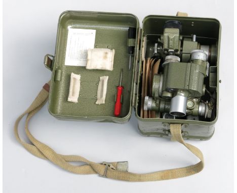 A Russian green enamelled level, mid-20th century, contained in original carry case with webbing straps, the case height 22cm