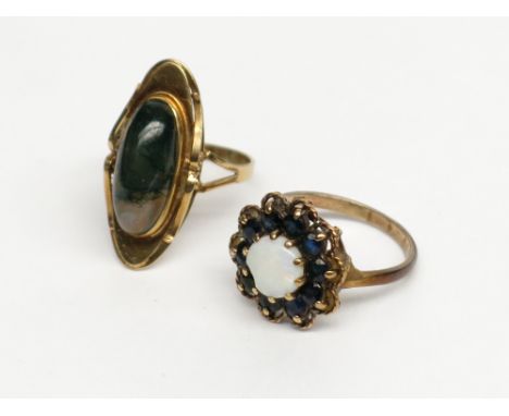 A 14ct gold ring set moss agate together with a 9ct gold opal and sapphire ring.