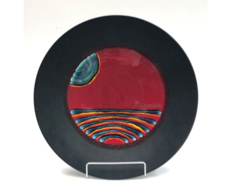 A Poole pottery Limited Edition Millennium charger, designed by Alan Clarke, No 0707 of 2000, with certificate and original b