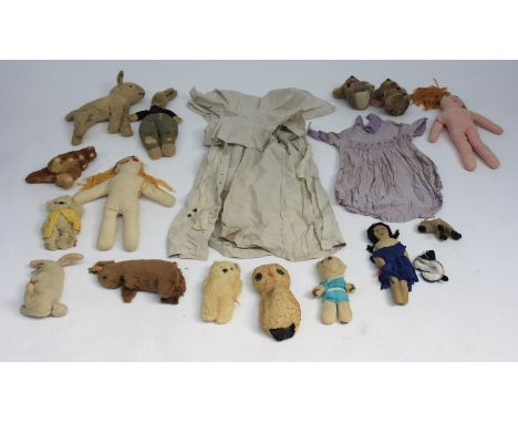 Vintage clothing and cuddly toys to include a Merrythought rabbit.