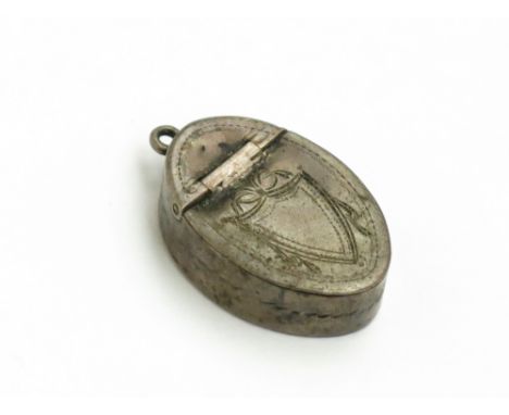 A Samuel Pemberton silver oval patch box with hinged shield engraved lid and suspension ring, Birmingham 1818.