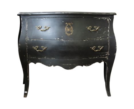 A continental black painted commode chest, the serpentine moulded top above two long drawers on splay legs, monogrammed withi