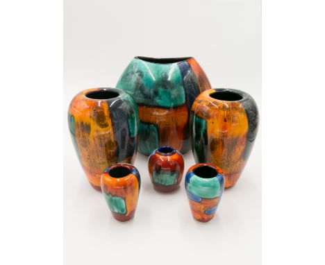 A Poole pottery large vase, gemstones pattern, height 26cm together with five other modern Poole pottery vases. Condition rep