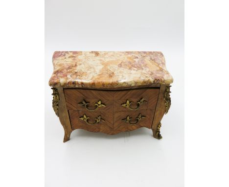 A French miniature kingwood commode, Louis XVI style, 20th century, with marble top above two drawers with gilt metal handles
