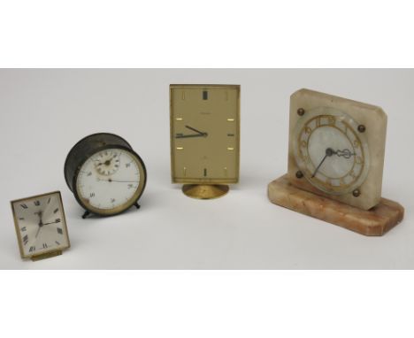 Two eight day small timepieces, one signed Swiza the other Richard, together with an unusual barrelled cased time piece with 