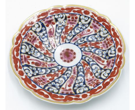 A Worcester porcelain dessert plate, 18th Century, painted in iron red, blue and gilt with the Princess Charlotte pattern, di