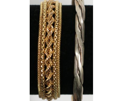 A 9ct gold bracelet, 12.7g and a silver bangle.