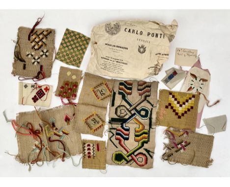 A quantity of wool tapestry on small pieces of buckram and hessian-like material, wrapped in a paper bag from a 19th century 