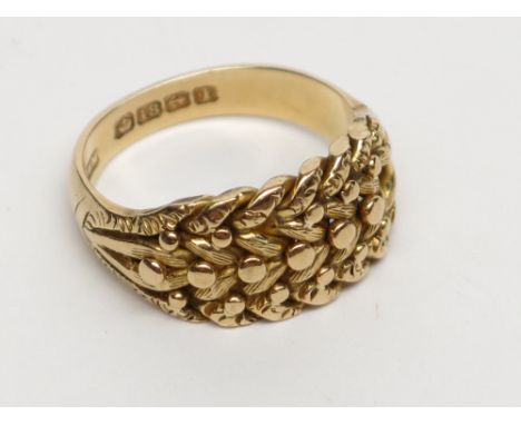 An early 20th century 18ct gold plaited ring, hall mark Birmingham 1910, 8.6g.