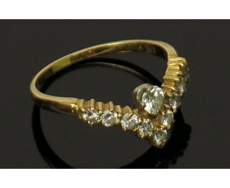 A diamond set wishbone 18ct gold ring. Condition report: Total weight 2.8g.