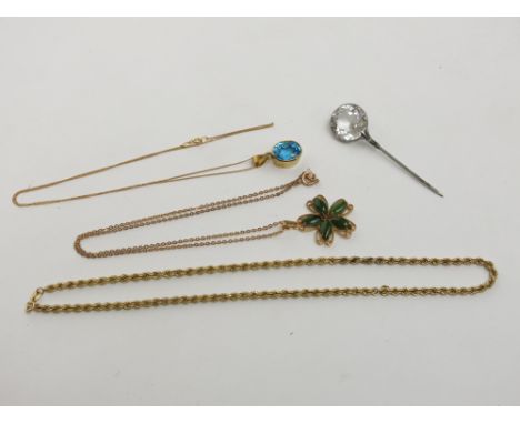 A 9ct gold ring set a blue stone, a 9ct gold mounted blue stone pendant and chain, a 9ct gold rope twist chain, 4.2g and four