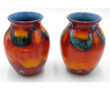 A Poole pottery vase, modern, of ovoid form with mottled glazes, height 20cm and another similar vase.
