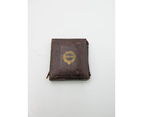 An early Victorian daguerreotype portrait photograph of a gentleman, in a brown leather case, 9 x 7.5cm.