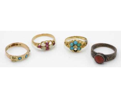 A Victorian 15ct gold ring set a turquoise flowerhead and three other Victorian gold rings.