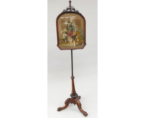 A pair of Victorian mahogany polescreens, each with a woolwork panel decorated with figures, dogs and game, on a cabriole tri