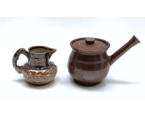 A saltglaze pub jug, 19th century, press moulded with hunting scenes and inscribed 'Soames' and Welsh Ale, height 10cm and a 