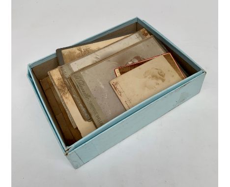 Late 19th/early 20th century portrait photographs.