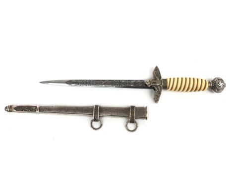 A Nazi German army officers dagger, with swastika, eagle and leaf decoration, etched blade by Clemen &amp; Jung, Solingen, ov