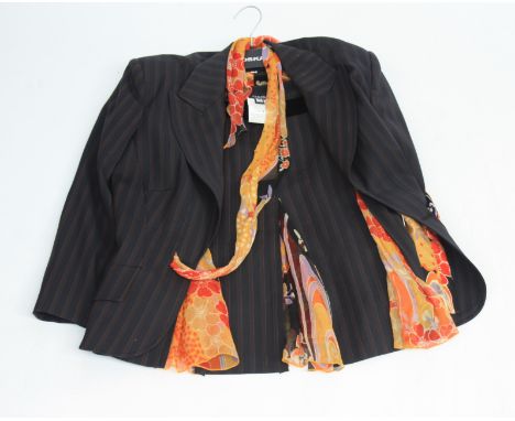 A Dolce &amp; Gabbana ladies skirt suit, the chocolate brown pin striped jacket with floral silk lining and matching crepe wa