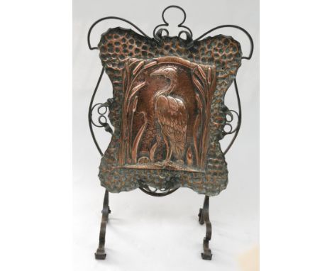 An Art Nouveau copper and wrought iron firescreen, height 81cm, width 53.5cm.