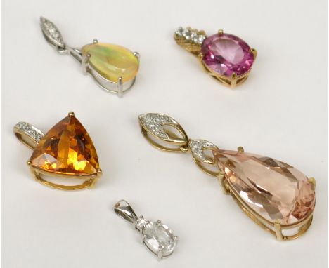 An opal and diamond white gold pendant and four other stone set gold pendants.