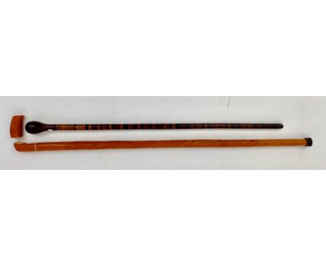 A walking cane, 19th Century, with turned handle and multi-turned specimen wood shaft, length 81cm and one other walking stic