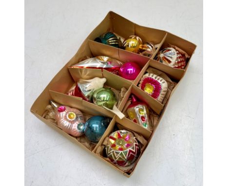 A collection of vintage coloured glass Christmas baubles.