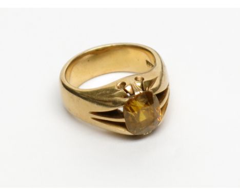 A heavy 18ct gold ring claw set an oval citrine maker's mark W & S, 16.7g. Condition report: Size P. Cushion cut stone 8.7 x 