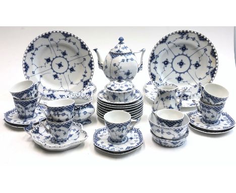 A Royal Copenhagen Lace pattern part tea and dinner service, decorated in underglaze blue with flowers. Condition report: Tea