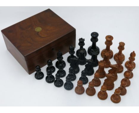 A Jacques & Son 'Staunton Chess-Men' ebony and boxwood chess set, the kings stamped 'Jacques London', the rooks and knights s