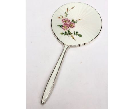 An Adie Brothers Ltd silver mirror, enamelled with a flowering dog rose branch on a cream guilloche enamel background. 