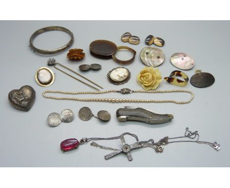 A silver bangle, other jewellery, cufflinks, a novelty penknife and an eyeglass 