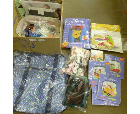 A collection of crafting items, including a Disney Winnie the Pooh felt bag kit, one other felt kit, threads, buttons, tapest