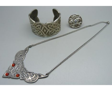 A St. Justin pewter necklace, a bangle and a ring 