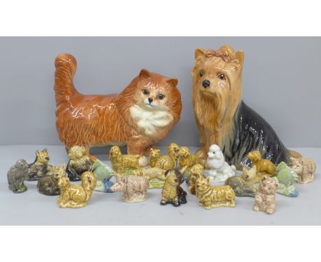 A Beswick cat, a Sylvac dog and a collection of Wade Whimsies 