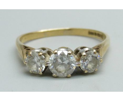 A 9ct gold and three stone cubic zirconia ring, 2.8g, U 